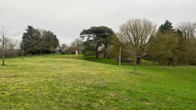 Scenic view of the Water Gardens with one of the sculptures visible